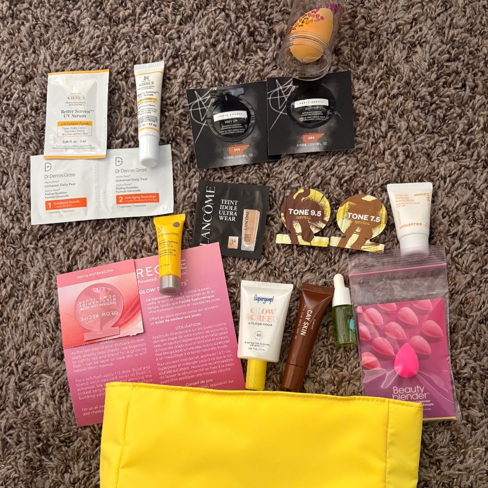 Samples , Sunscreens and a makeup bag